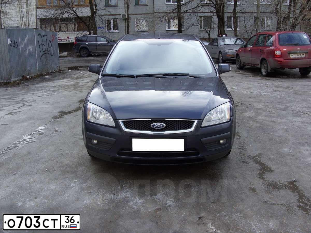 Фото автомобиля LADA 1117 KALINA, 2010 — госномер О703СТ36. Цвет: СЕРЕБРИСТО-КРАСНЫЙ