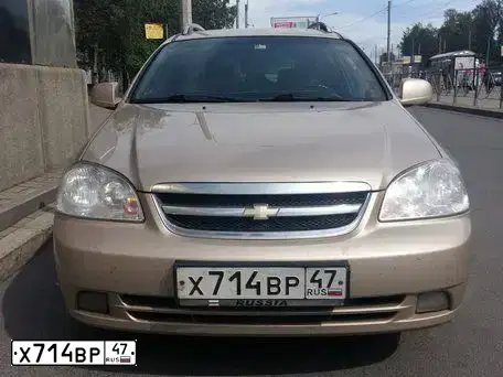 Фото автомобиля CHEVROLET LACETTI, 2011 — госномер К696АМ53. Цвет: БЕЖЕВЫЙ