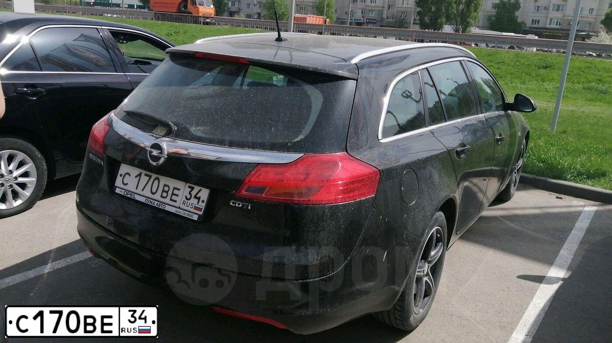 Фото автомобиля OPEL INSIGNIA, 2010 — госномер О413АХ134. Цвет: ЧЕРНЫЙ