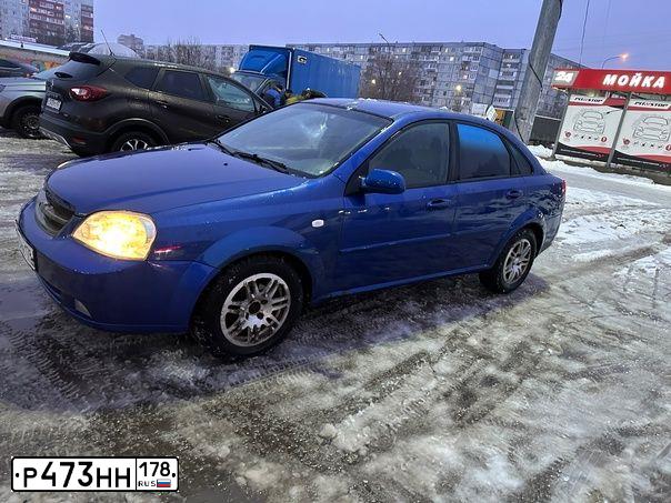 Фото автомобиля CHEVROLET LACETTI, 2008 — госномер Х100ТТ763. Цвет: синий