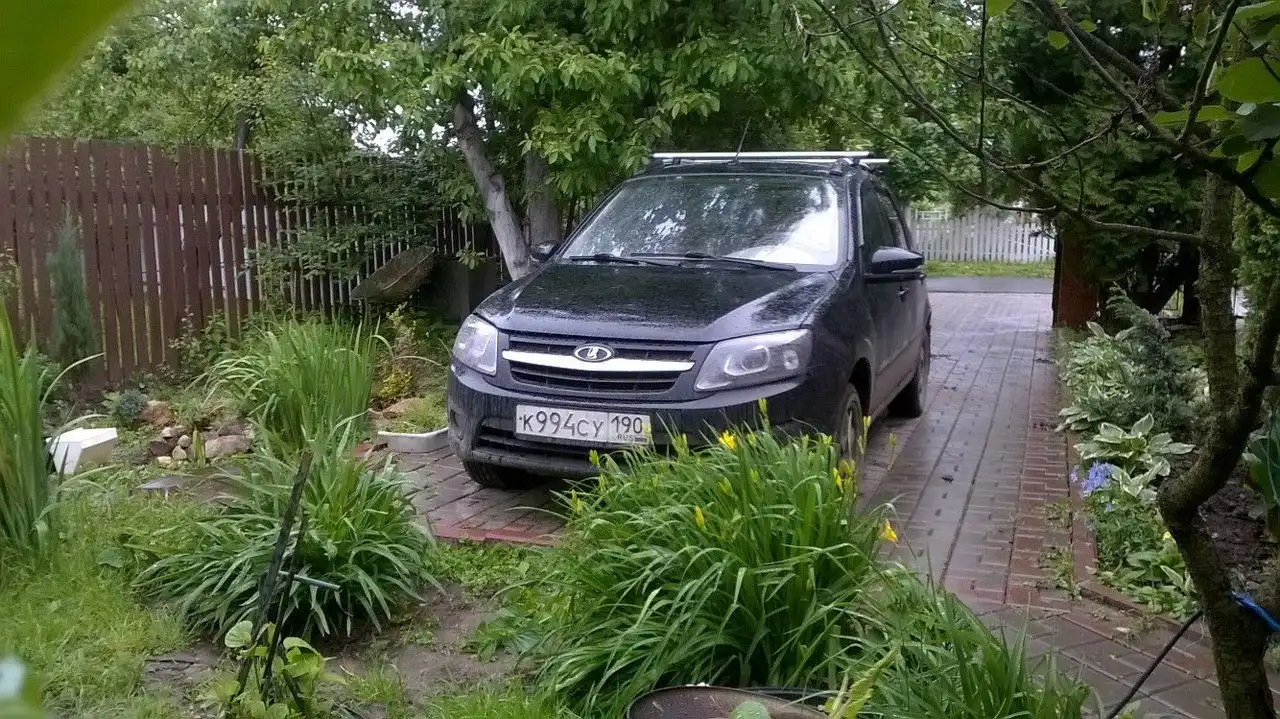 Фото автомобиля LADA 1119 KALINA, 2012 — госномер К994СУ190. Цвет: ЧЕРНЫЙ
