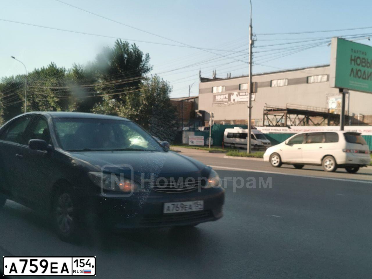 Фото автомобиля HYUNDAI GETZ, 2008 — госномер А759ЕА154. Цвет: КРАСНЫЙ