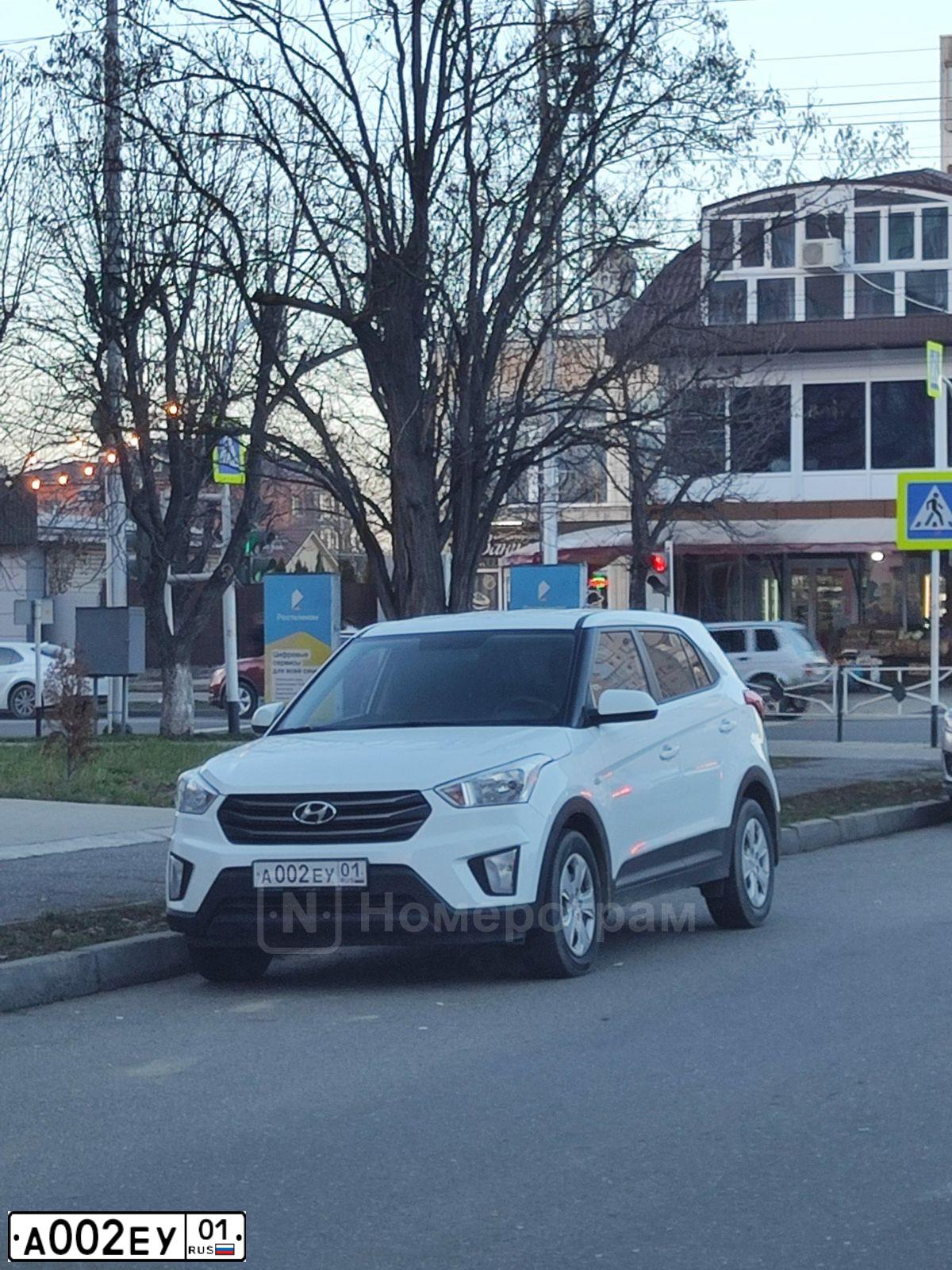 Фото автомобиля FORD FOCUS, 2010 — госномер В989ВА123. Цвет: Белый