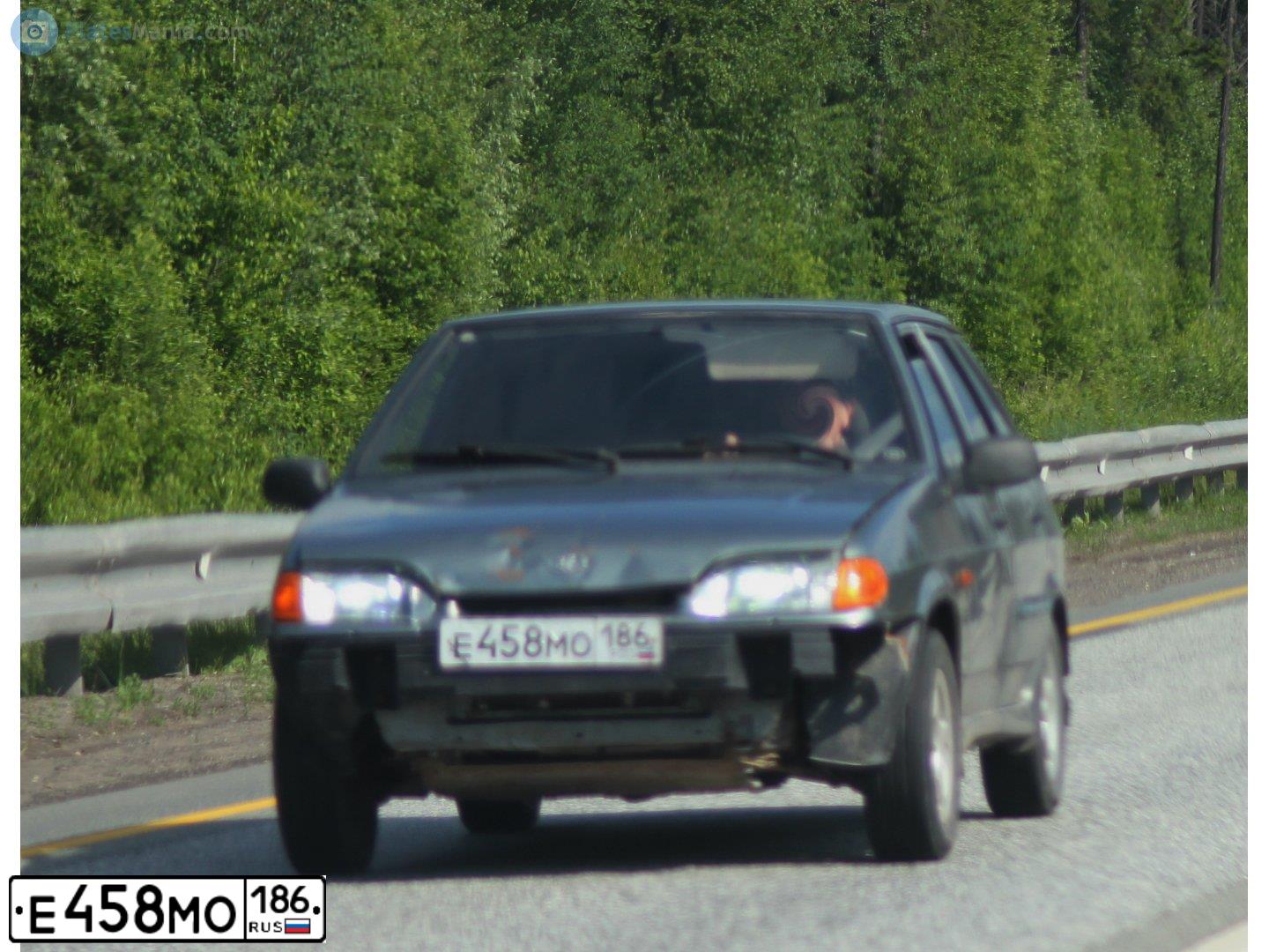 Фото автомобиля LADA 2114 SAMARA, 2007 — госномер Е458МО186. Цвет: СРЕДНИЙ СЕРО-ЗЕЛЕН. МЕТ.