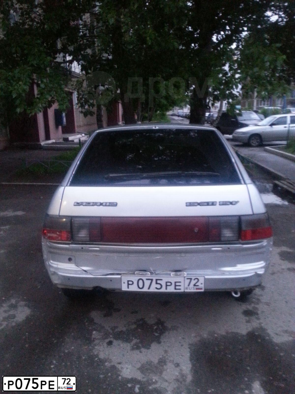Фото автомобиля LADA 2112, 2003 — госномер О005НТ72. Цвет: СВЕТЛО-СЕРЕБРИСТЫЙ МЕТАЛЛ