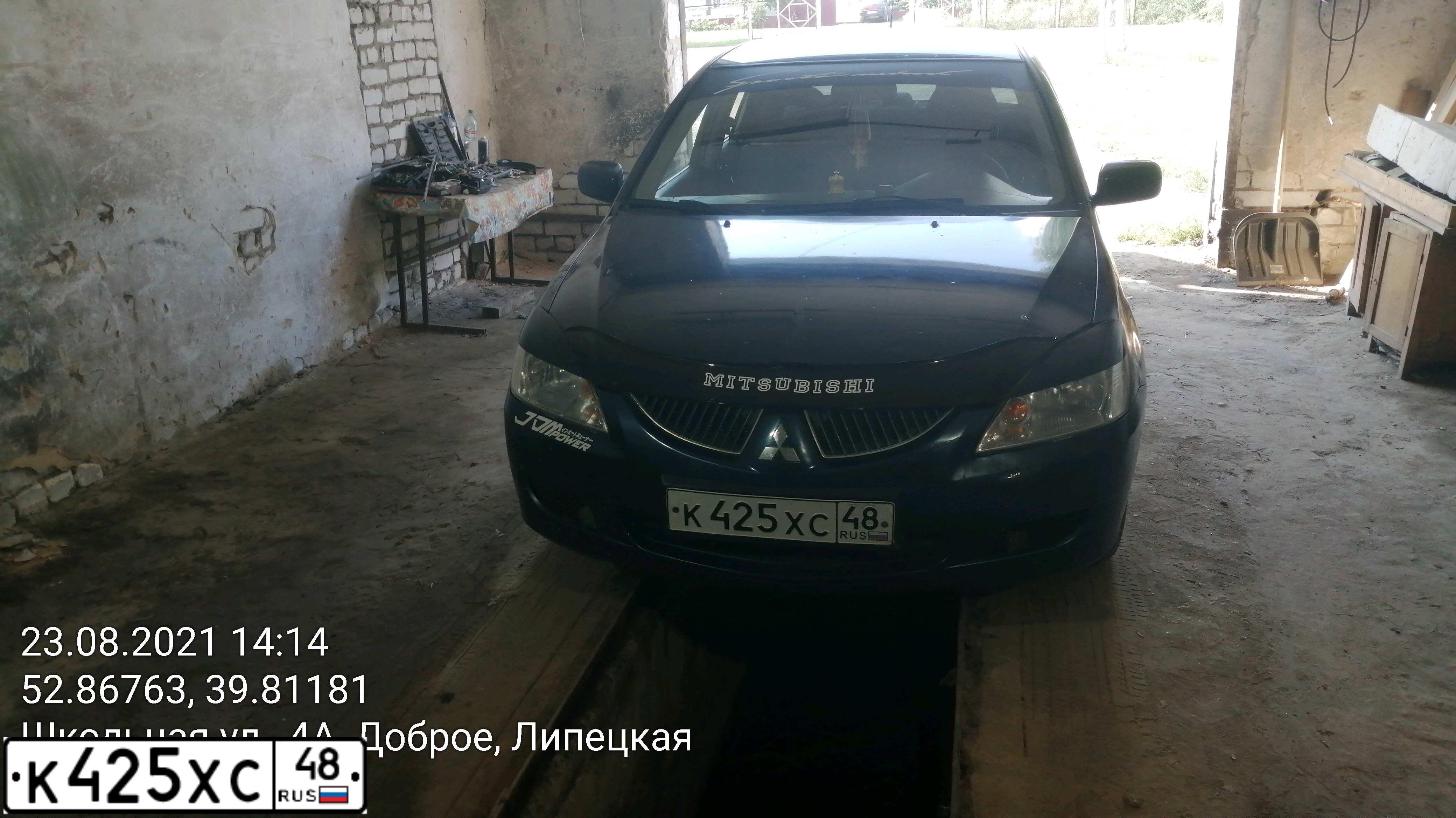 Фото автомобиля MITSUBISHI LANCER, 2004 — госномер К425ХС48. Цвет: синий