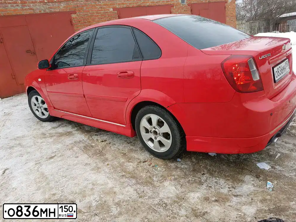 Фото автомобиля CHEVROLET LACETTI, 2008 — госномер В177АХ180. Цвет: Красный