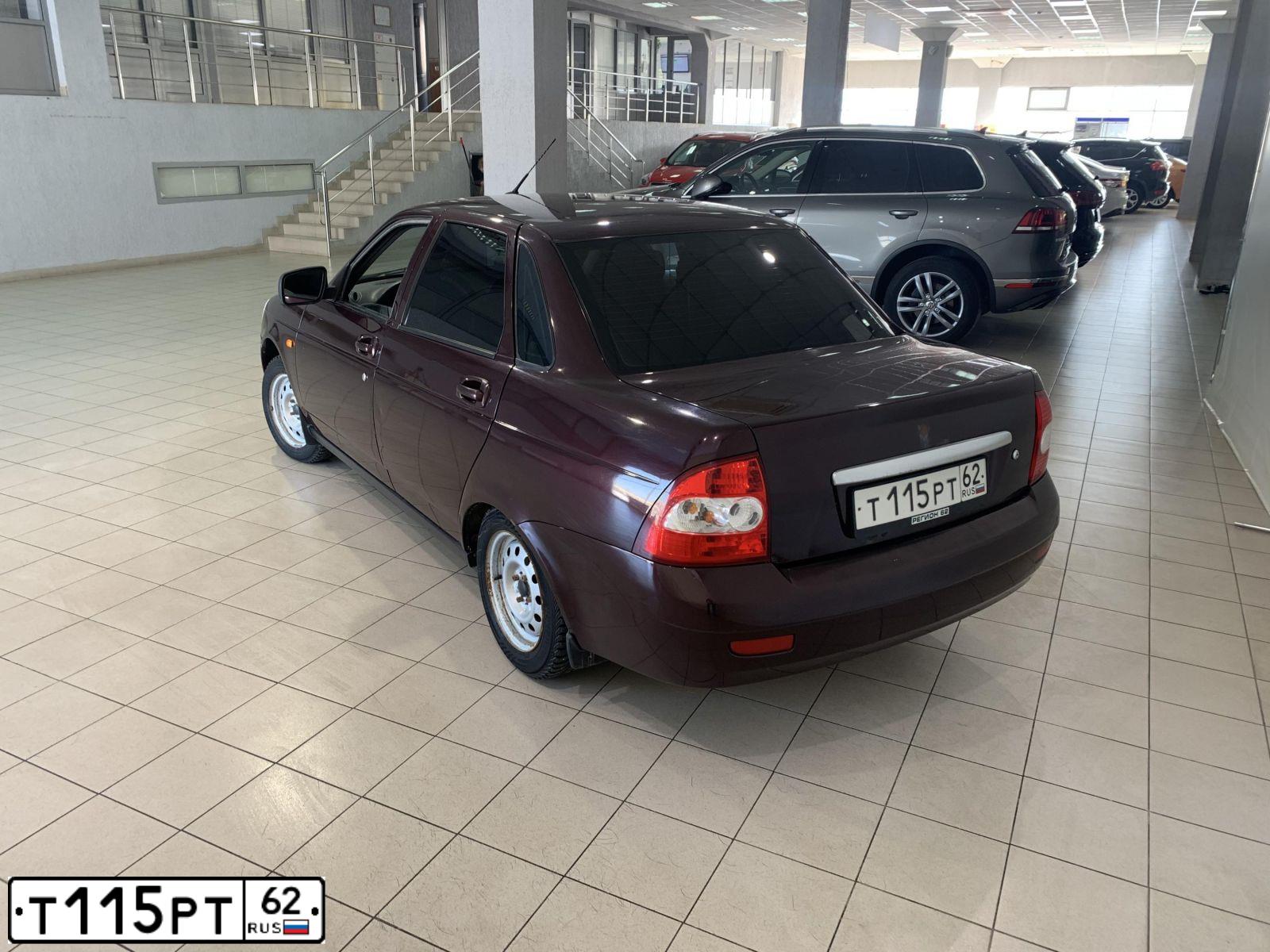 Фото автомобиля LADA 2170 PRIORA, 2013 — госномер Т115РТ62. Цвет: ТЕМНО-ВИШНЕВЫЙ