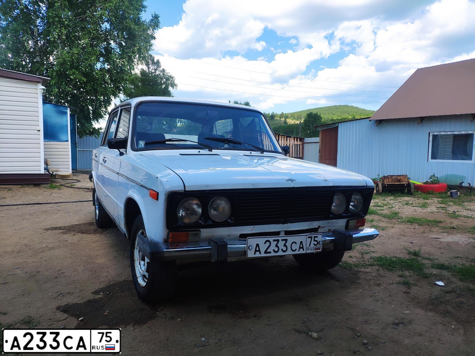 Фото автомобиля LADA 2106, 1999 — госномер А233СА75. Цвет: БЕЛЫЙ