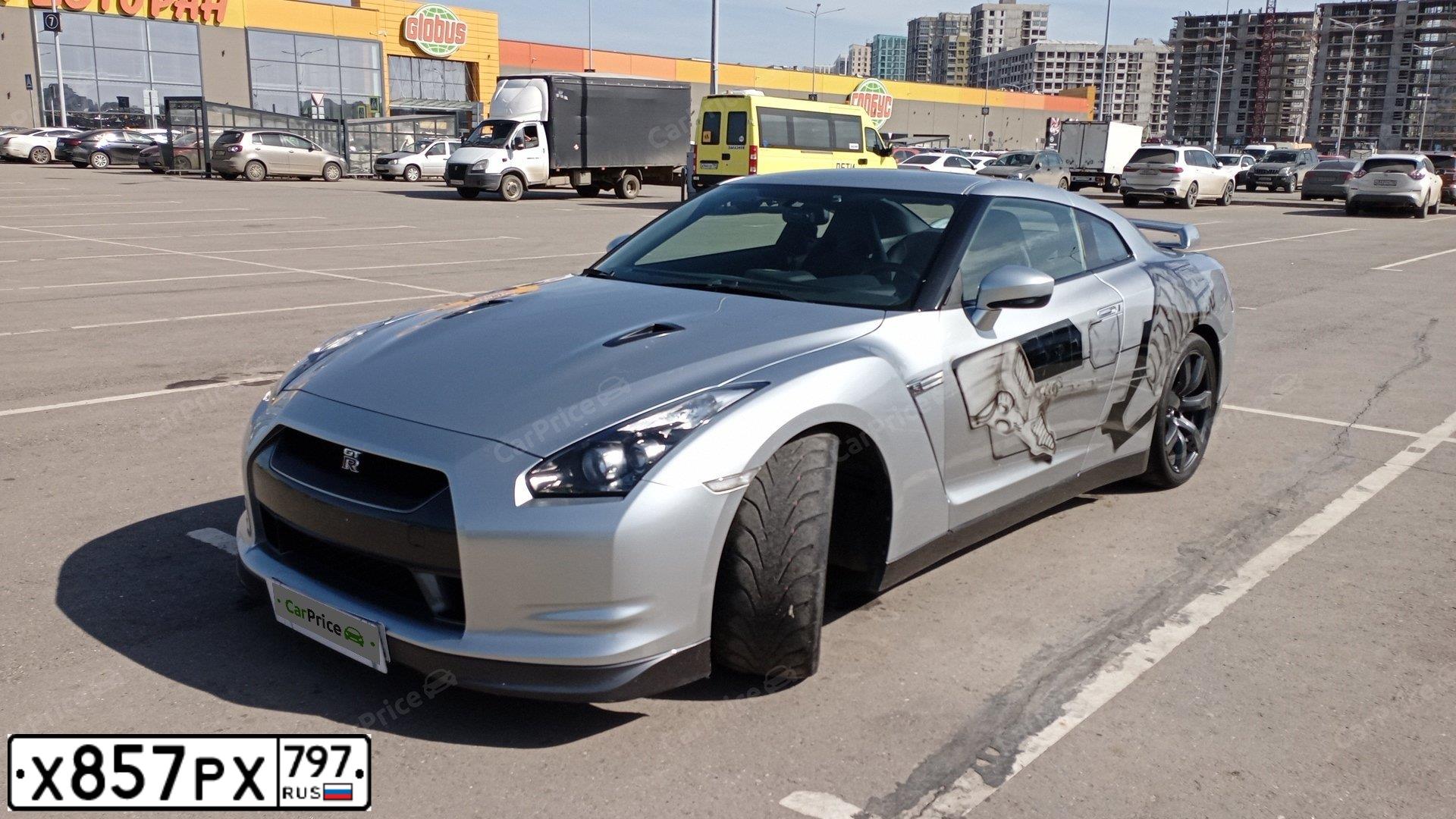 Фото автомобиля NISSAN GT-R, 2008 — госномер К571НМ62. Цвет: серый