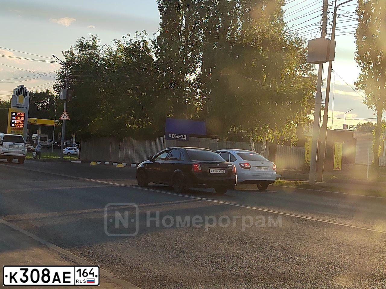 Фото автомобиля LADA XRAY GАВ330, 2021 — госномер К308АЕ164. Цвет: Коричневый