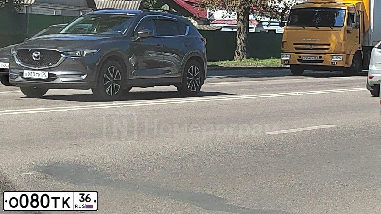 Фото автомобиля MAZDA CX-5, 2015 — госномер Р896ЕР70. Цвет: Красный