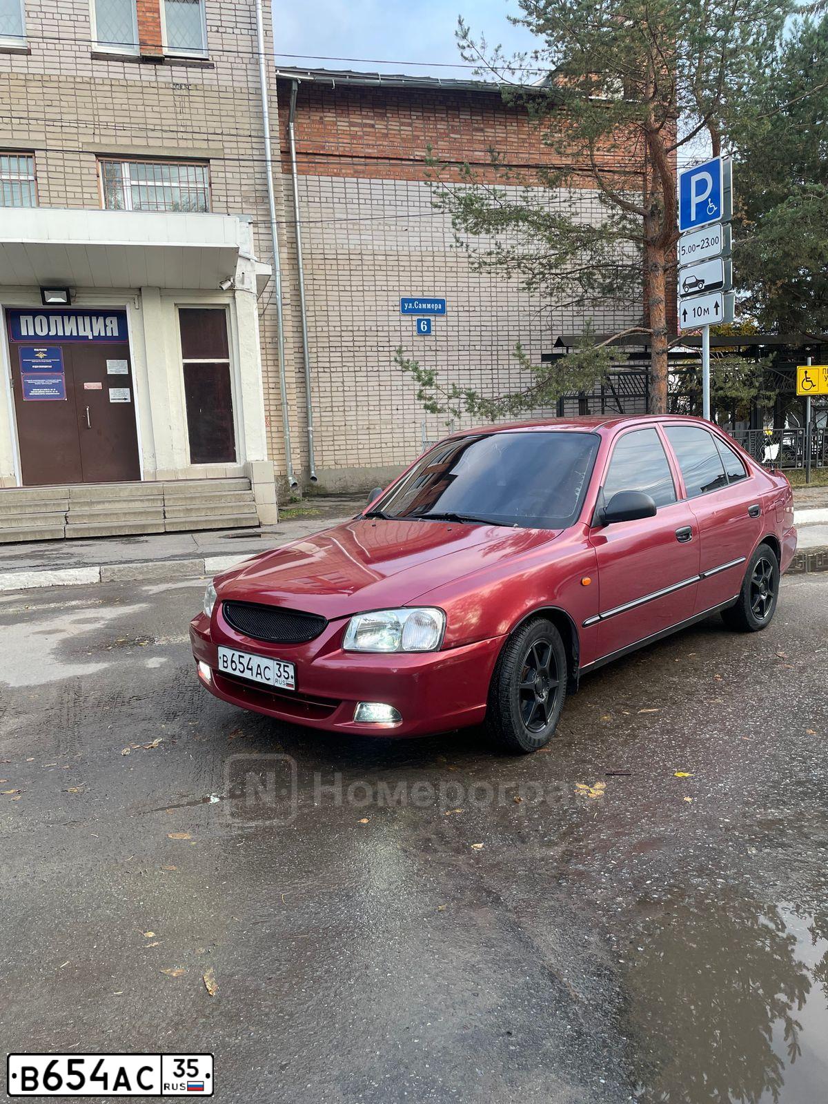 Фото автомобиля TAGAZ ACCENT, 2006 — госномер В654АС35. Цвет: Красный