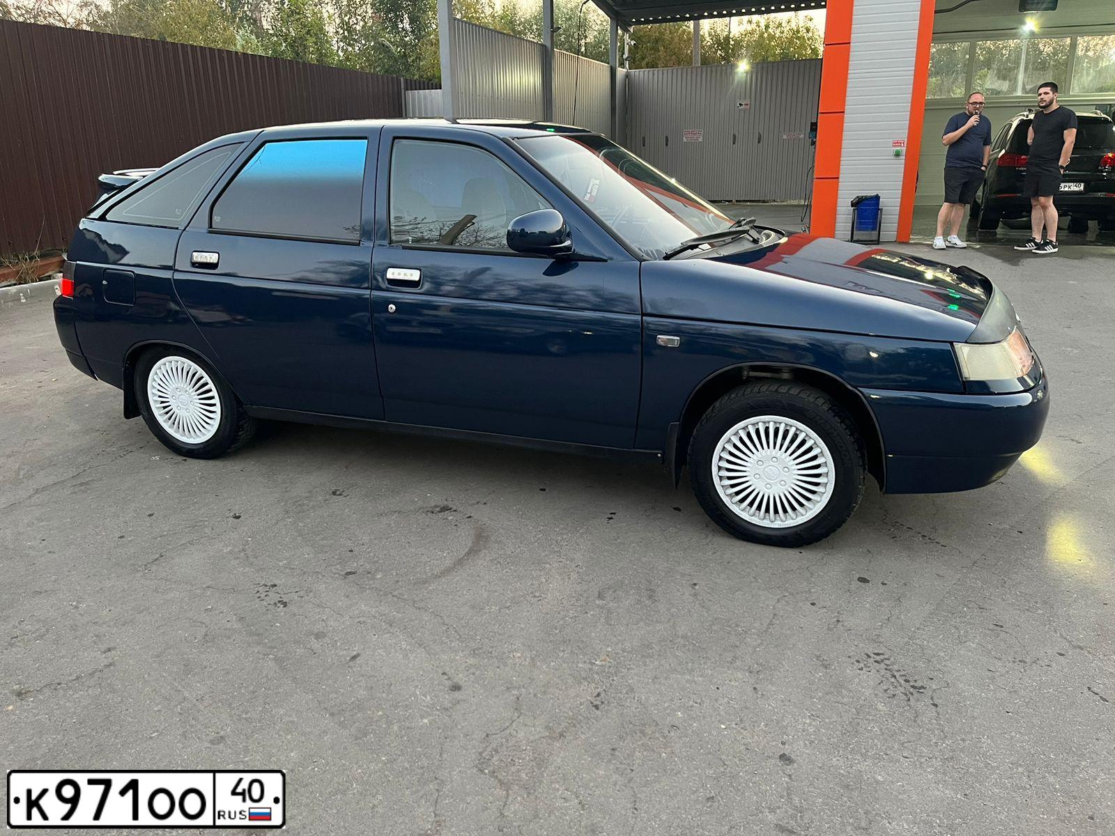 Фото автомобиля LADA 2112, 2005 — госномер К971ОО40. Цвет: Темно-синий
