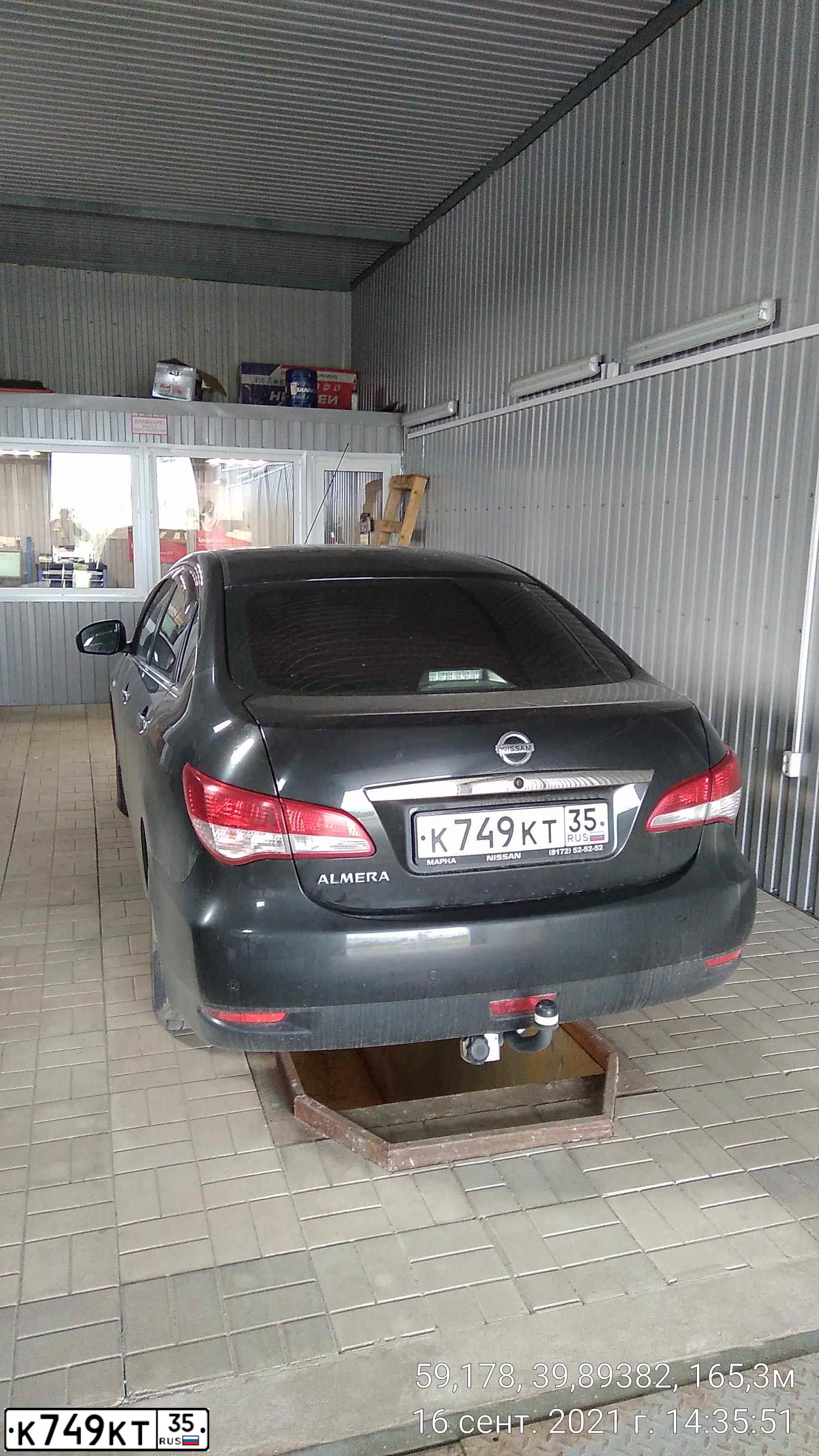 Фото автомобиля NISSAN ALMERA /AVTOVAZ/, 2017 — госномер К749КТ35. Цвет: ЧЕРНЫЙ