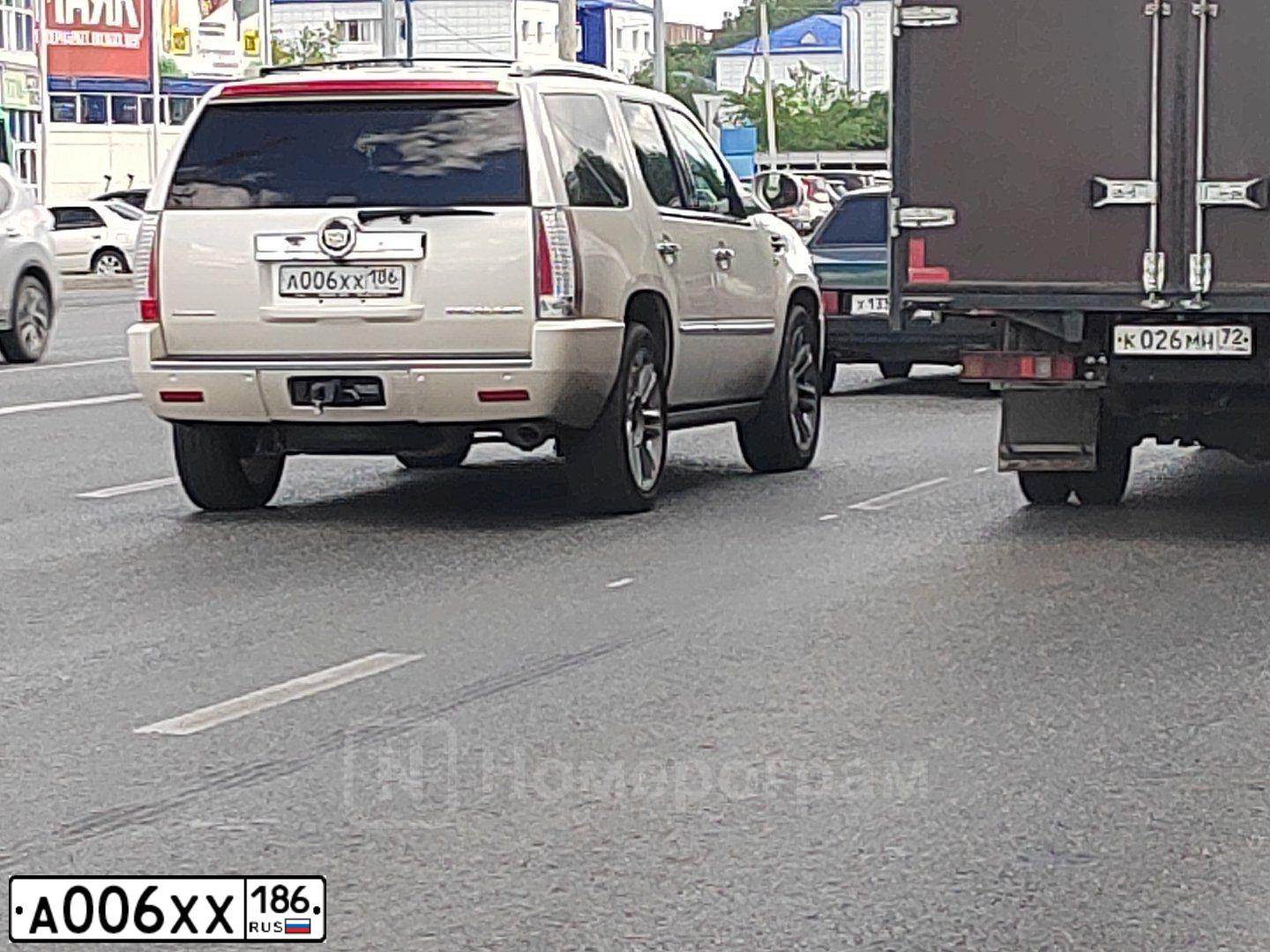 Фото автомобиля CHEVROLET EXPRESS, 2005 — госномер Р624РВ186. Цвет: ЧЕРНЫЙ