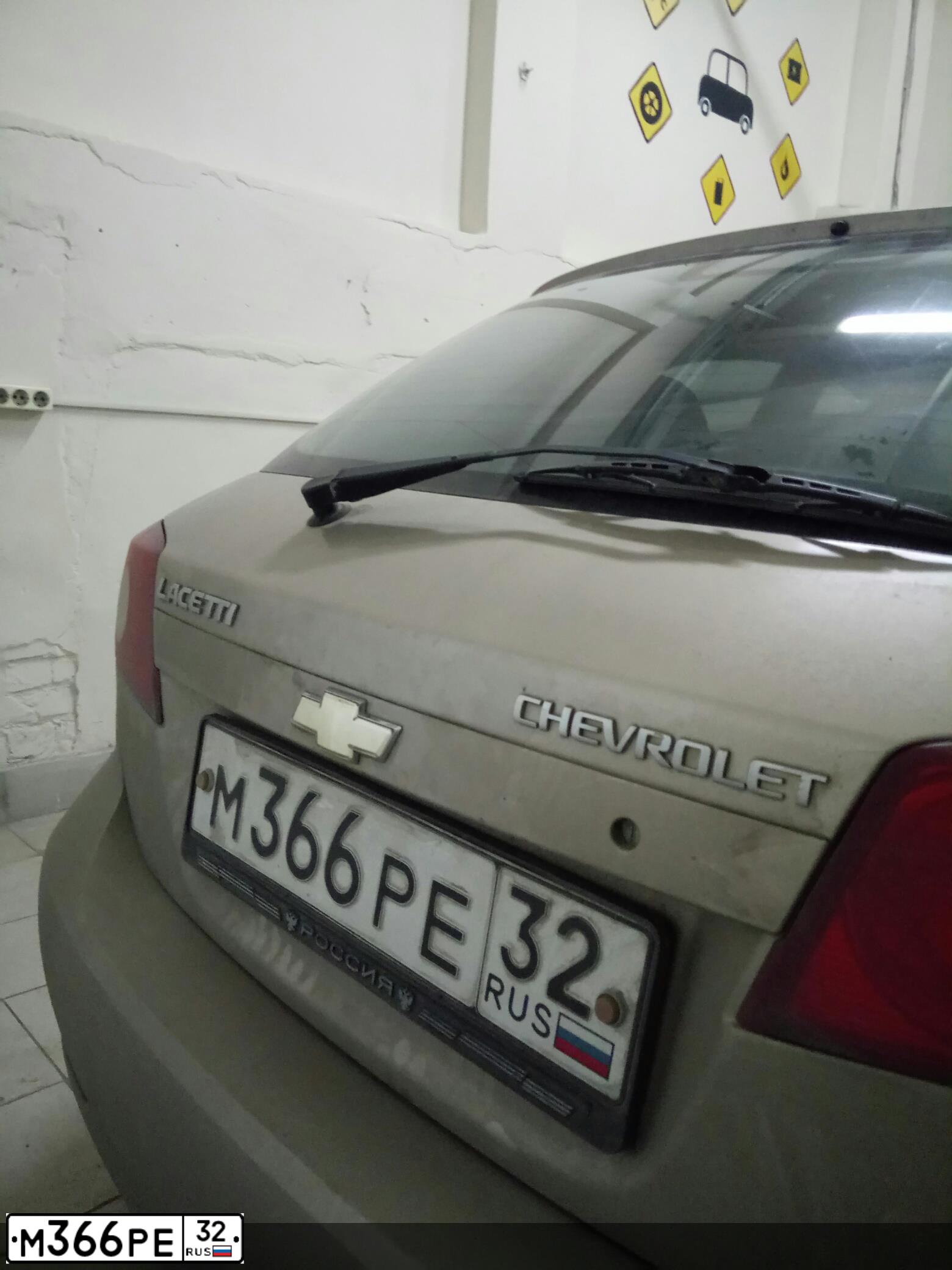 Фото автомобиля CHEVROLET LACETTI, 2007 — госномер Х059НУ150. Цвет: БЕЖЕВЫЙ