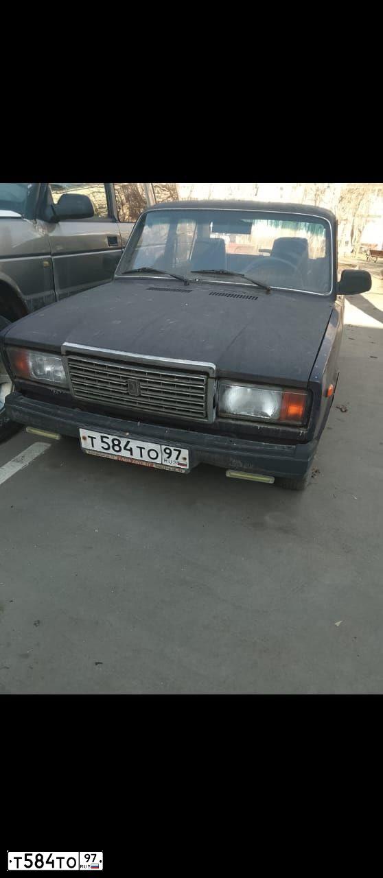 Фото автомобиля LADA 2107, 2005 — госномер О418ВК550. Цвет: ФИОЛЕТОВЫЙ
