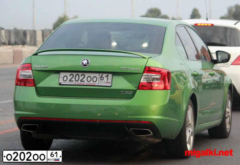 Фото автомобиля CHEVROLET AVEO, 2006 — госномер О202ОО61. Цвет: Красный