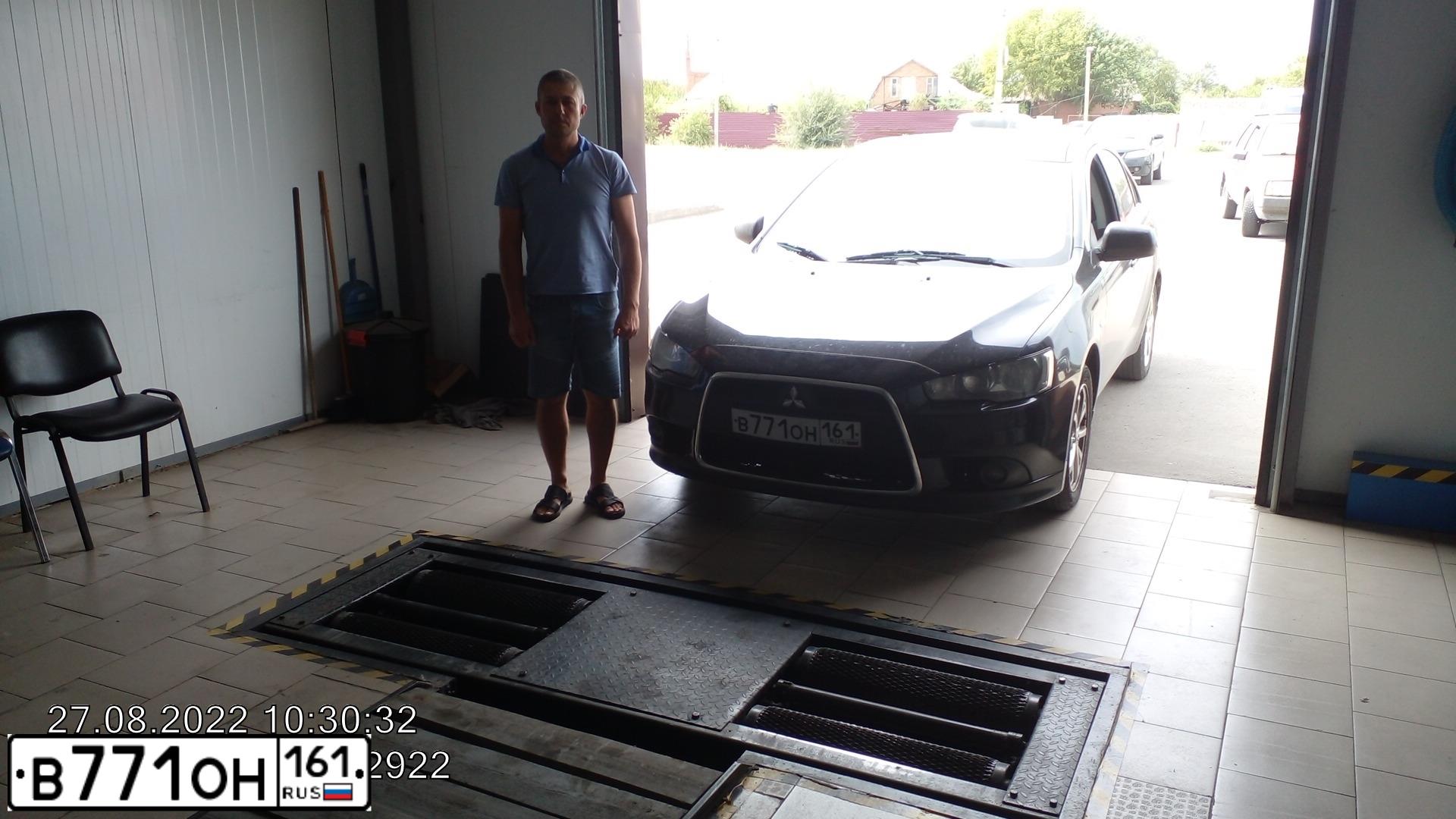 Фото автомобиля MITSUBISHI LANCER, 2012 — госномер В771ОН161. Цвет: ЧЕРНЫЙ