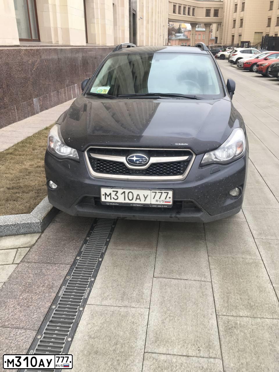 Фото автомобиля SUBARU IMPREZA, 2013 — госномер М310АУ777. Цвет: СЕРЫЙ ТЕМНЫЙ