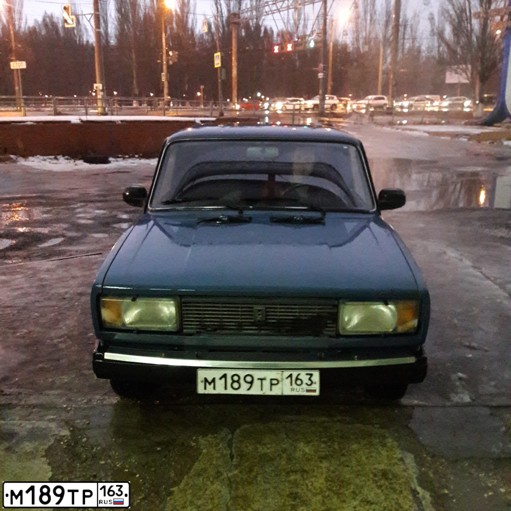 Фото автомобиля RENAULT LOGAN, 2012 — госномер О023МА152. Цвет: БЕЖЕВЫЙ