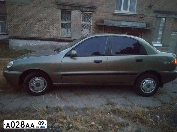 Фото автомобиля HYUNDAI SOLARIS, 2011 — госномер А028АА09. Цвет: КРАСНЫЙ ГРАНАТ