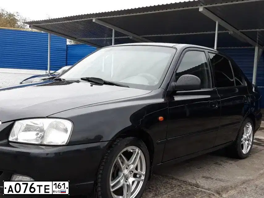 Фото автомобиля TAGAZ ACCENT, 2008 — госномер А076ТЕ161. Цвет: ЧЕРНЫЙ