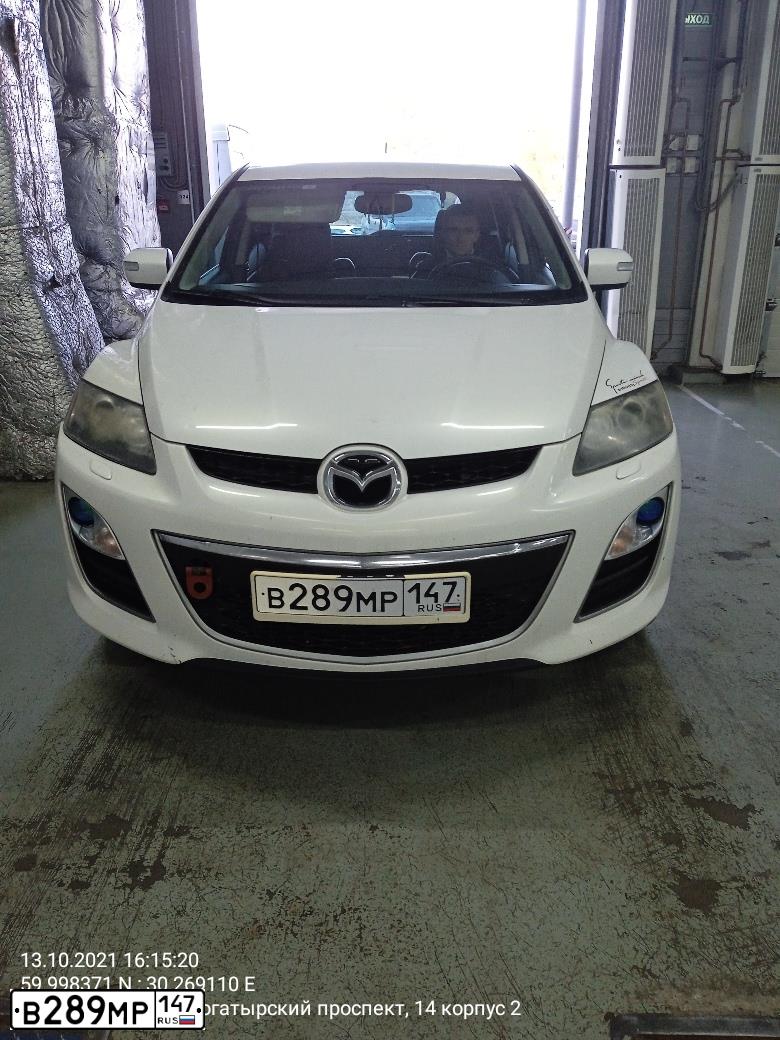Фото автомобиля MAZDA CX-7, 2010 — госномер В289МР147. Цвет: Белый