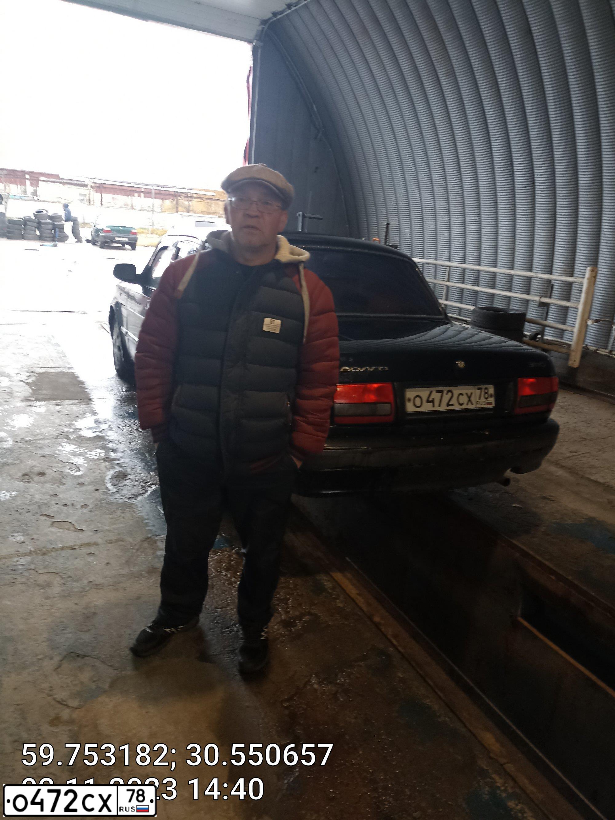 Фото автомобиля GAZ 3110 WOLGA, 2004 — госномер О472СХ78. Цвет: ЧЕРНИЛЬНЫЙ