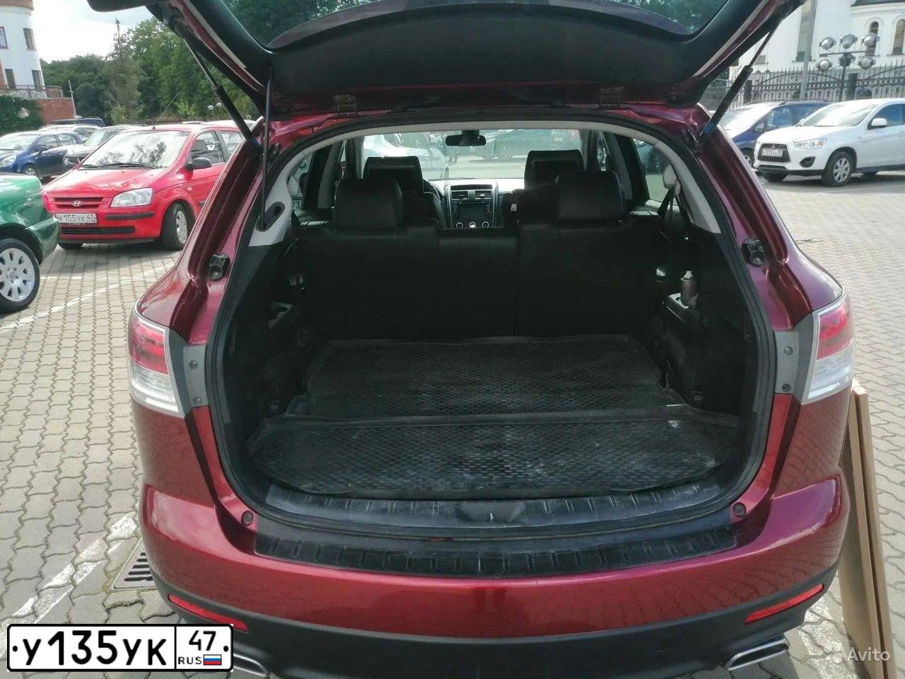Фото автомобиля OPEL VECTRA, 1998 — госномер М973АМ53. Цвет: ВИШНЕВЫЙ