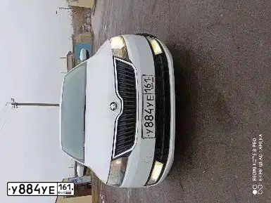 Фото автомобиля SKODA RAPID, 2015 — госномер Р729АВ193. Цвет: БЕЛЫЙ