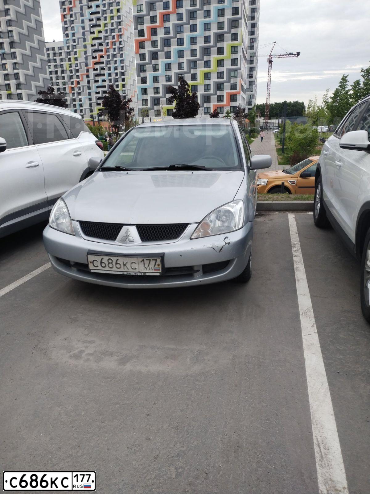Фото автомобиля MITSUBISHI LANCER, 2006 — госномер С686КС177. Цвет: СЕРЕБРИСТЫЙ