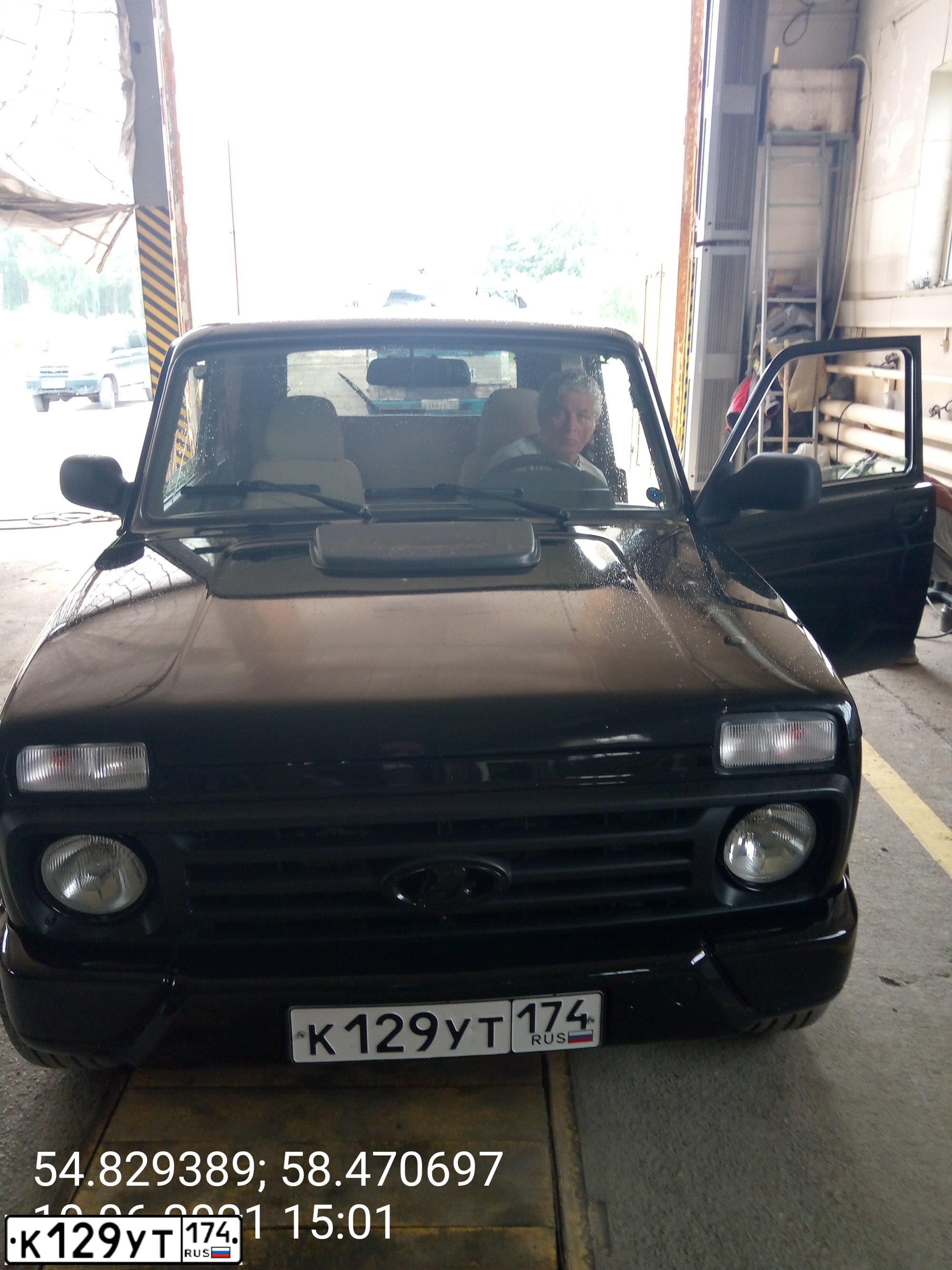Фото автомобиля LADA 2121 NIVA, 2016 — госномер К129УТ174. Цвет: ЧЕРНЫЙ