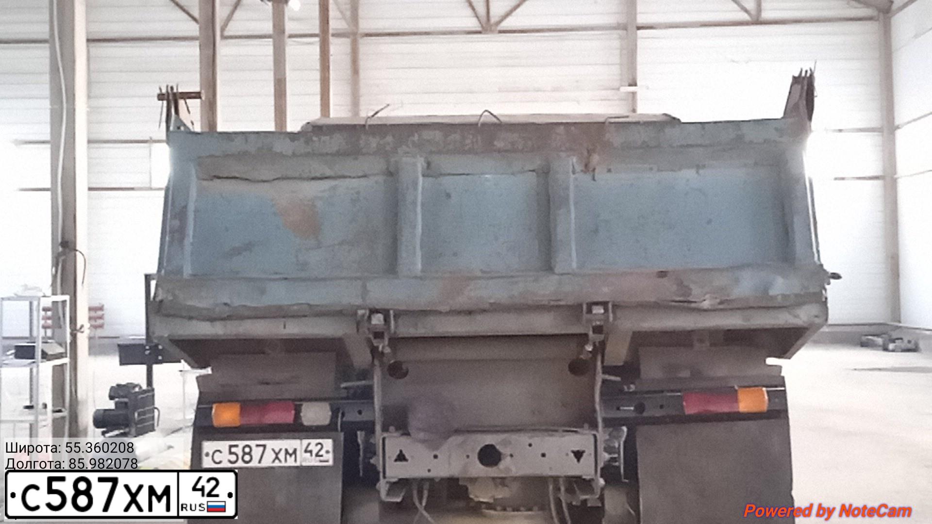 Фото автомобиля KAMAZ 55111 /6X4/, 1995 — госномер С588ВА42. Цвет: ХАКИ