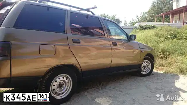 Фото автомобиля LADA 2111 LADA, 1999 — госномер К345АЕ161. Цвет: СЕРЕБРИСТ КОРИЧ-ЗЕЛЕ