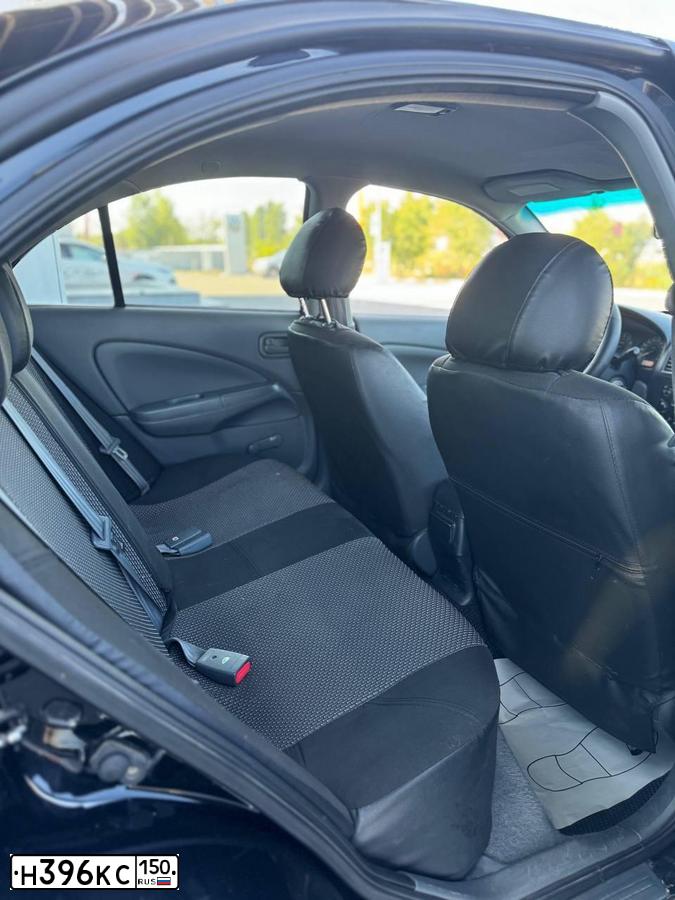 Фото автомобиля NISSAN ALMERA, 2007 — госномер У950КХ31. Цвет: ЧЕРНЫЙ