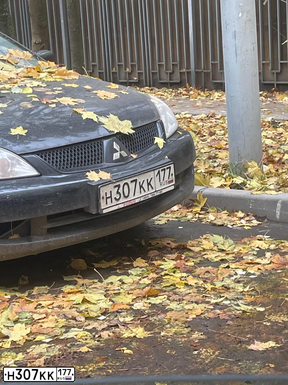 Фото автомобиля MITSUBISHI LANCER, 2006 — госномер Н307КК177. Цвет: ЧЕРНЫЙ