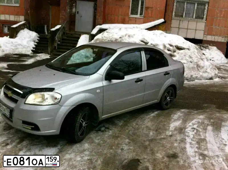 Фото автомобиля CHEVROLET AVEO, 2008 — госномер Е081ОА159. Цвет: Серебристый