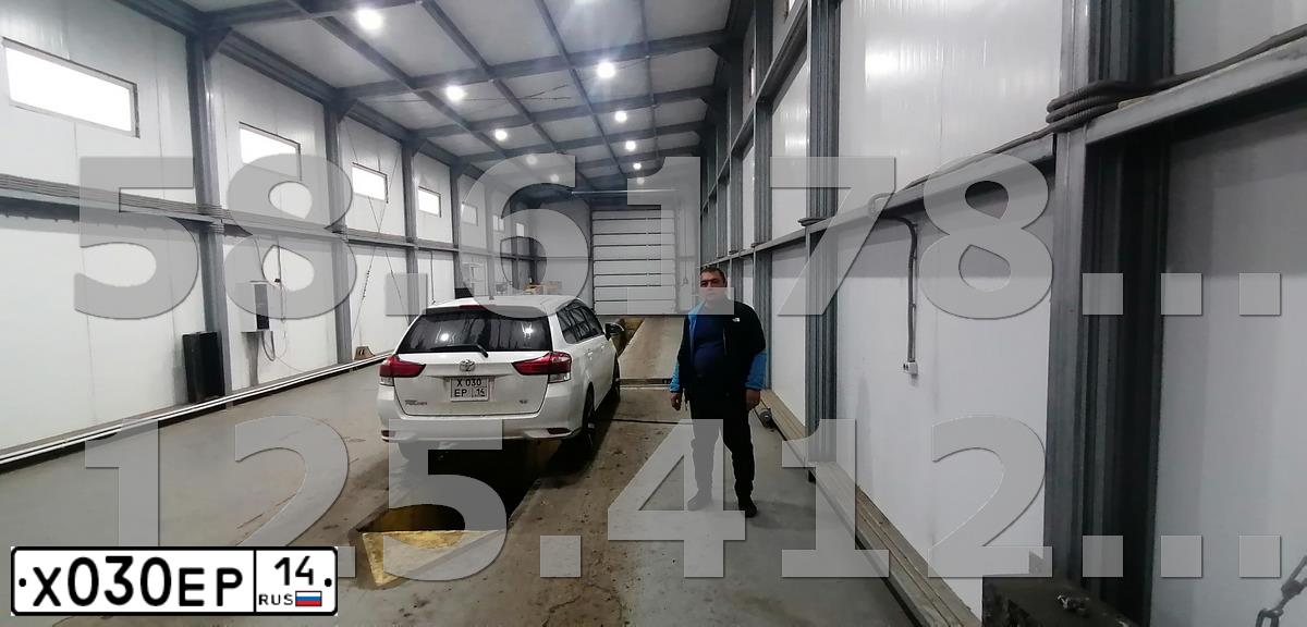 Фото автомобиля ЛАДА 217030 LADA PRIORA, 2009 — госномер К492ЕО193. Цвет: Сине-Черный
