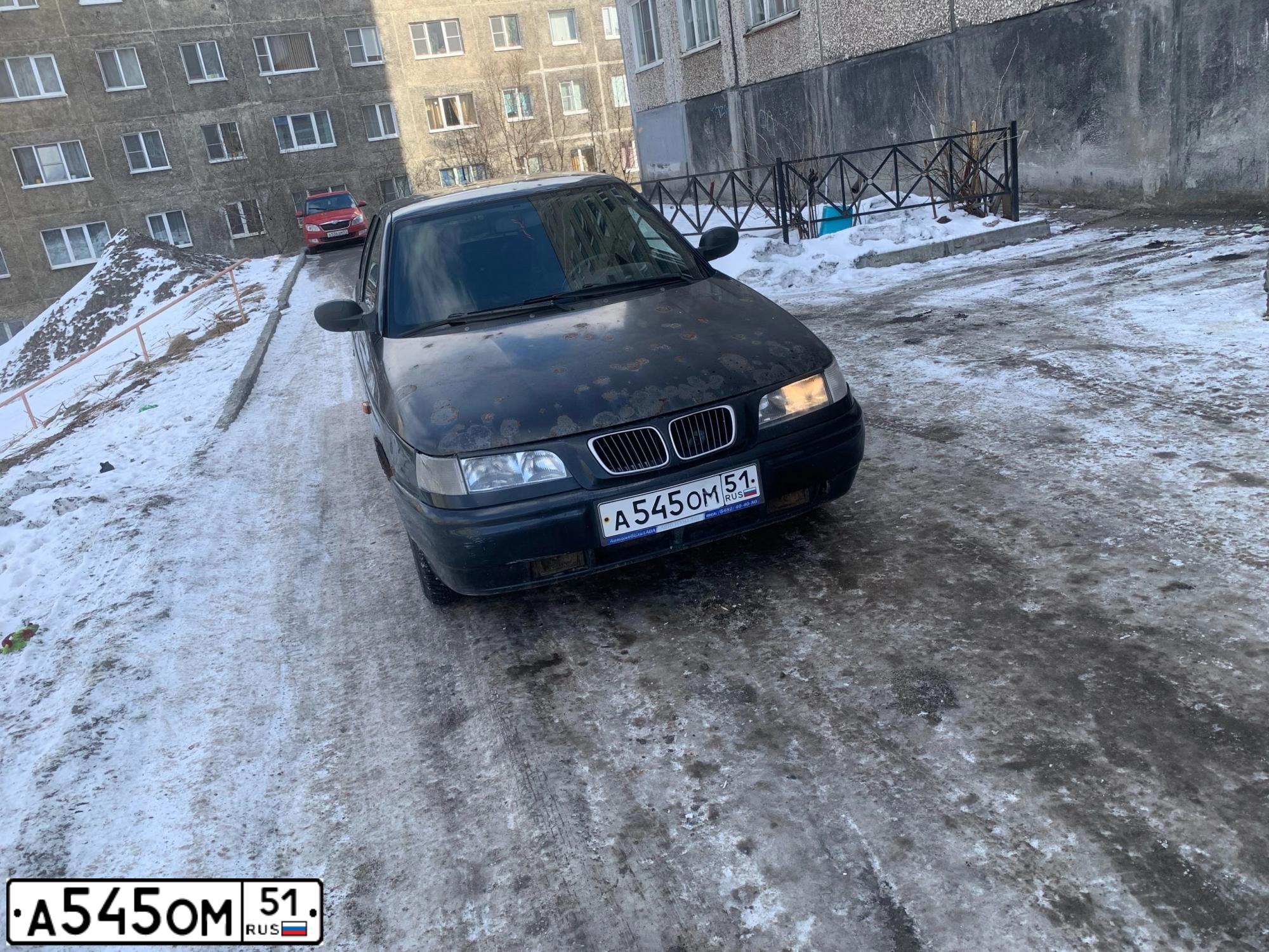 Фото автомобиля LADA 2110 LADA, 2005 — госномер А545ОМ51. Цвет: ГРАФИТОВЫЙ МЕТАЛЛИК