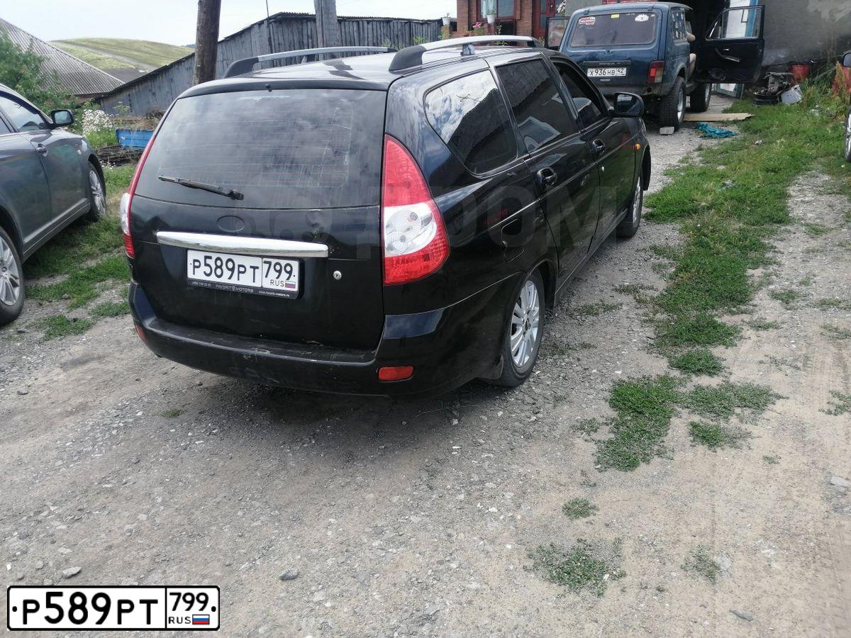 Фото автомобиля LADA 2171 PRIORA, 2010 — госномер Р742МС154. Цвет: ЧЕРНЫЙ