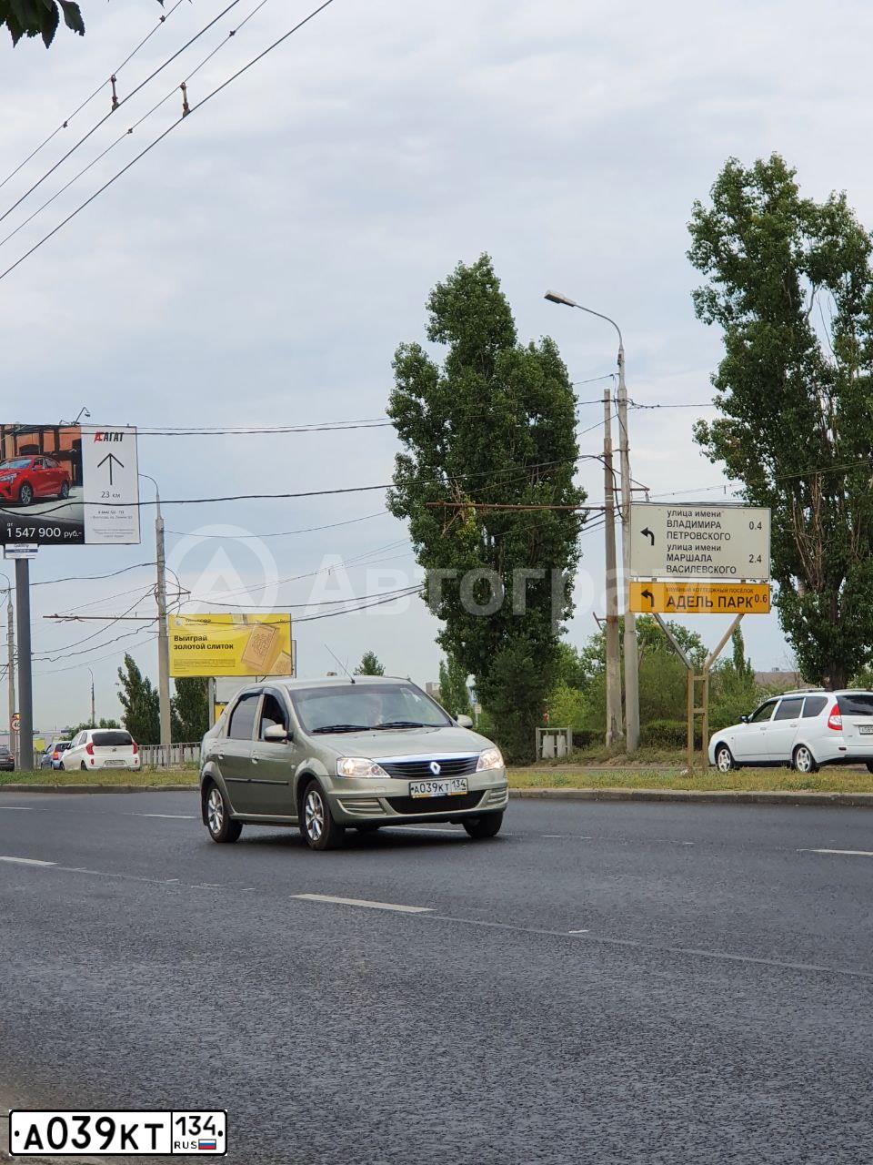 Фото автомобиля RENAULT LOGAN, 2013 — госномер А039КТ134. Цвет: БЕЖЕВЫЙ