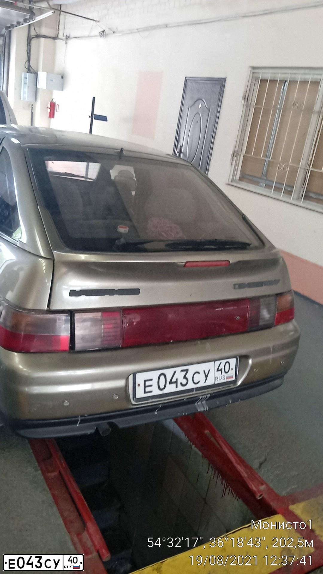 Фото автомобиля LADA 2112, 2001 — госномер Е043СУ40. Цвет: СЕРЕБРИСТЫЙ СЕРО-ЗЕЛЕНЫЙ