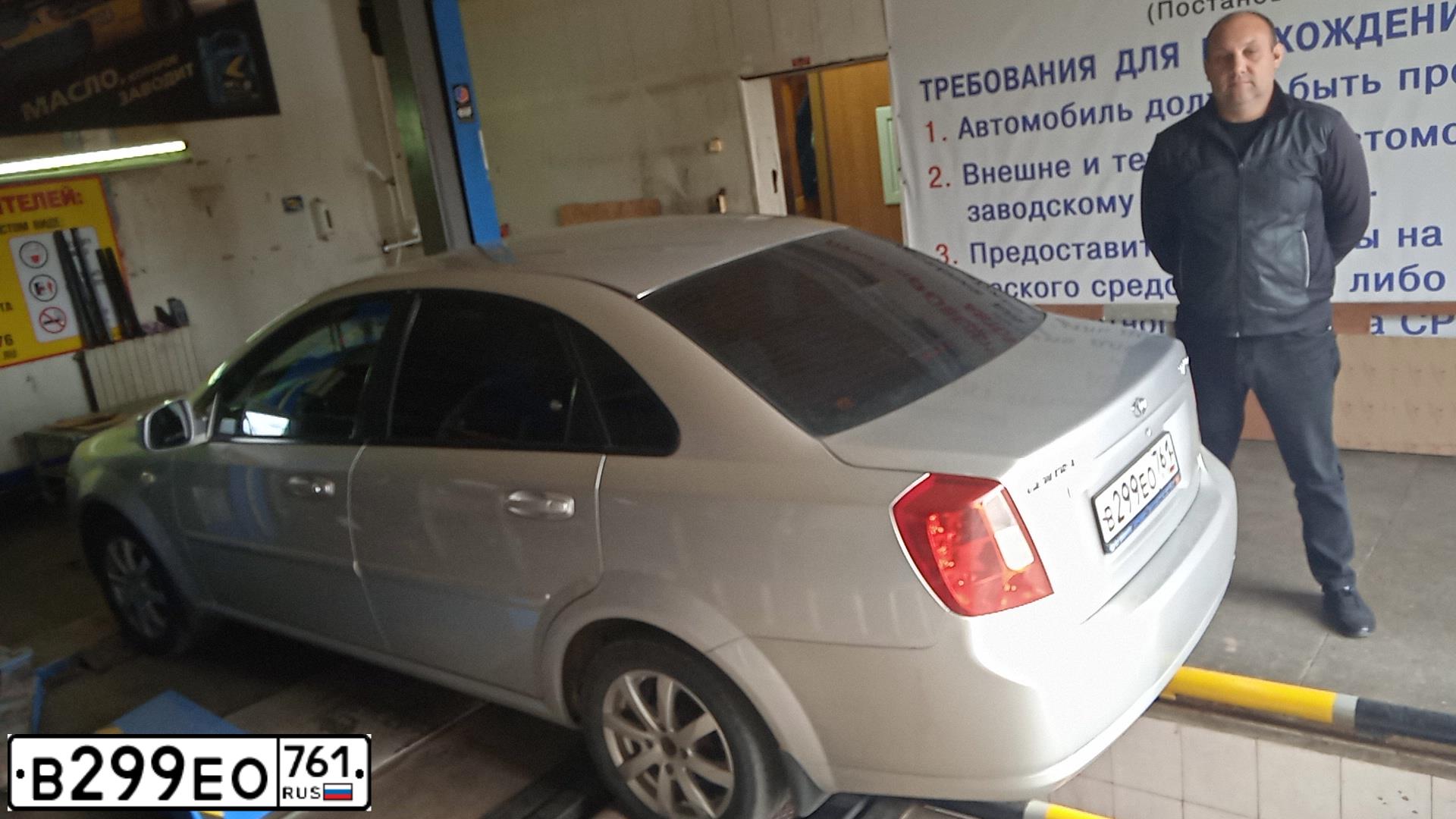 Фото автомобиля DAEWOO GENTRA, 2015 — госномер В299ЕО761. Цвет: СЕРЕБРИСТЫЙ