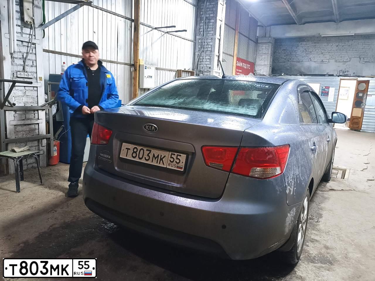Фото автомобиля KIA CERATO, 2010 — госномер Р345АЕ197. Цвет: СВЕТЛО-СЕРЫЙ