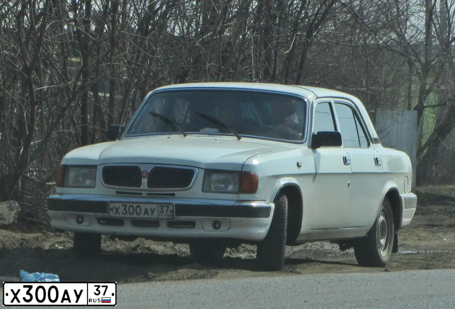 Фото автомобиля GAZ 3110 WOLGA, 2001 — госномер О290ОТ99. Цвет: ЧЕРНЫЙ