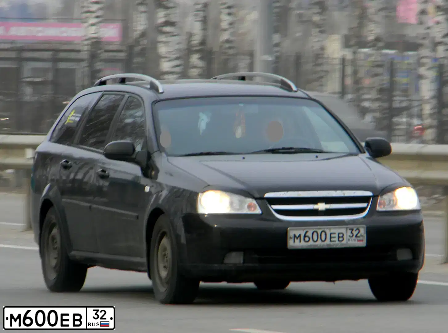 Фото автомобиля CHEVROLET LACETTI, 2006 — госномер К665АР57. Цвет: ЧЕРНЫЙ