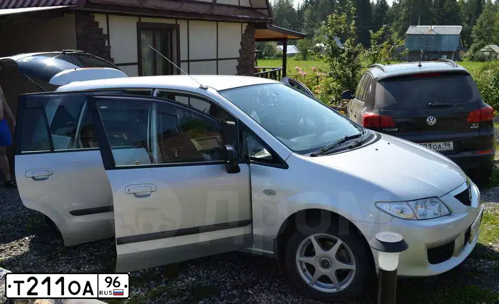 Фото автомобиля FORD FOCUS, 2004 — госномер Т211ОА96. Цвет: Темно-синий