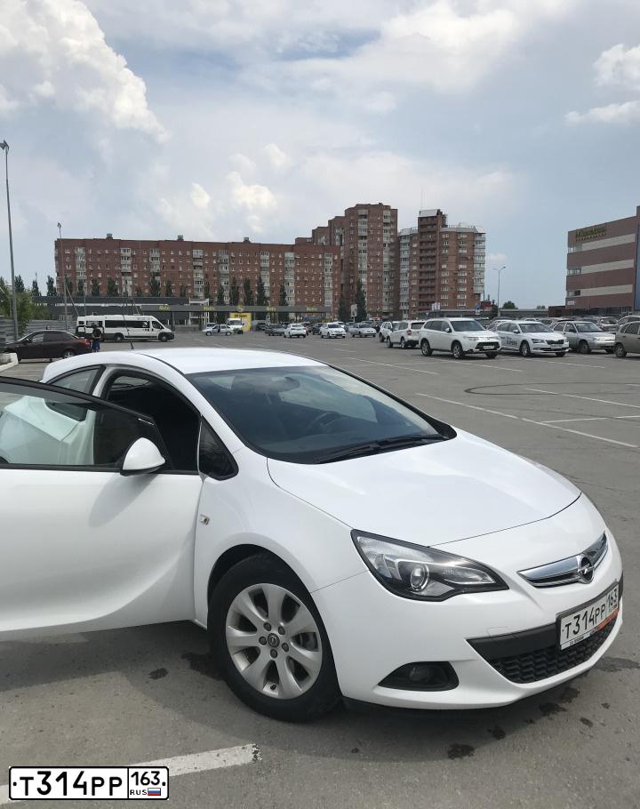 Фото автомобиля OPEL ASTRA, 2013 — госномер Т314РР163. Цвет: БЕЛЫЙ